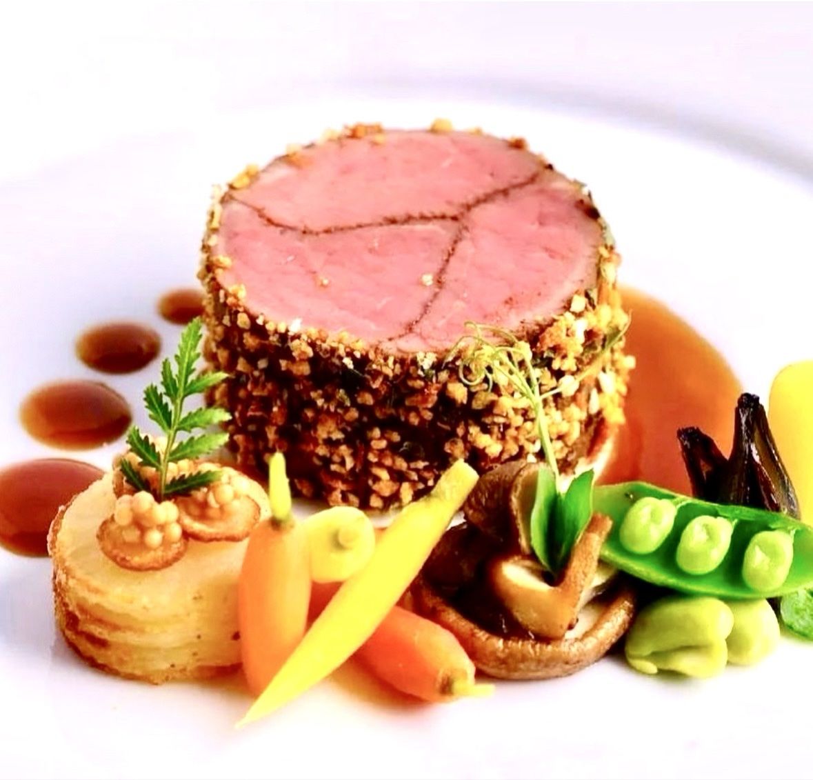 Herb crusted veal with garden vegetables