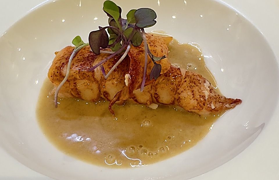 Butter poached lobster tail in veloute