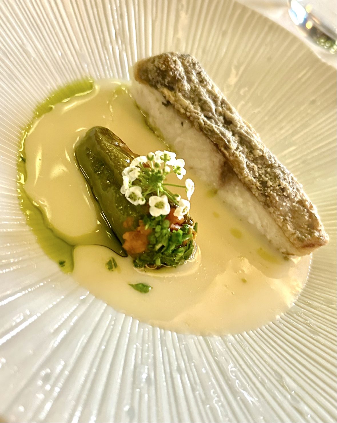 Sea bass fillet with beurre blanc and herbs