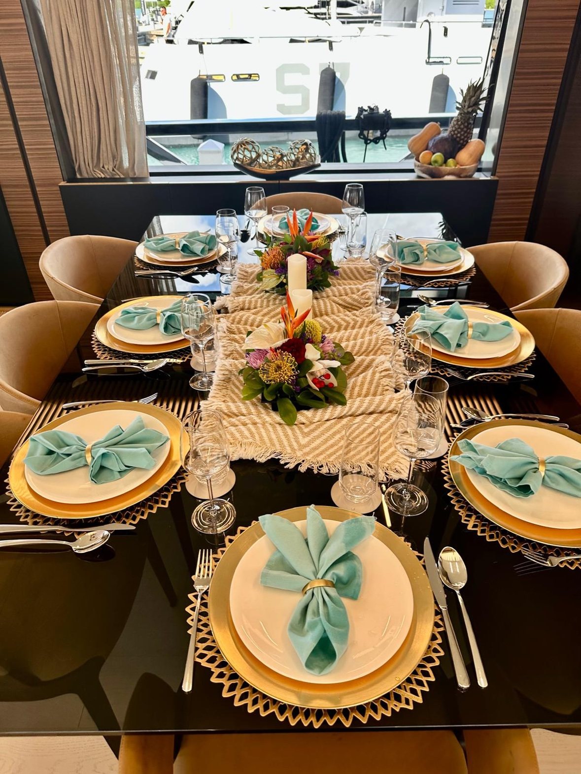 Dining room tablescape with marina view