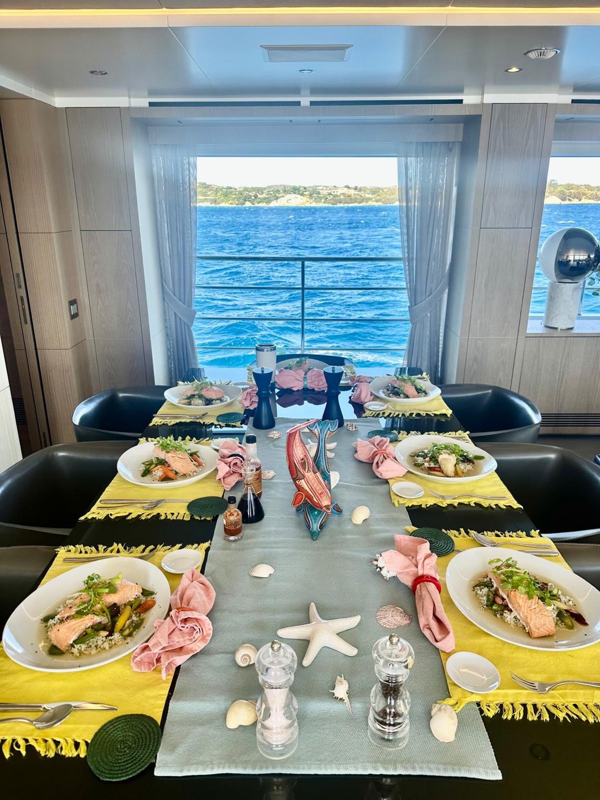Lunch service at the table with a view of open water