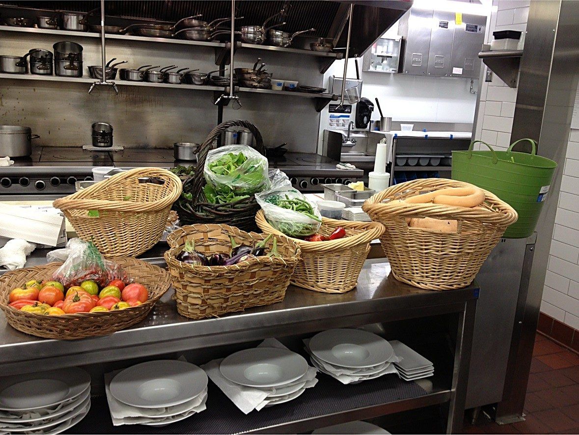 Wicker baskets of farm produce in the kitchen