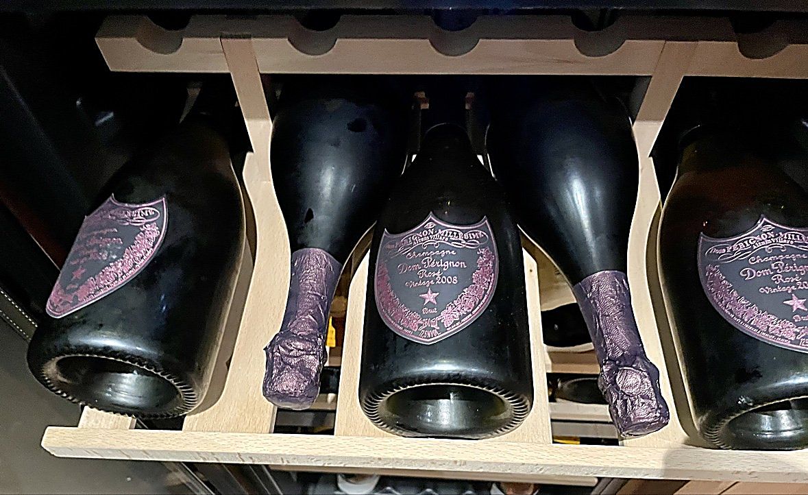 Dom Perignon Rose 2008 bottles in the cellar rack